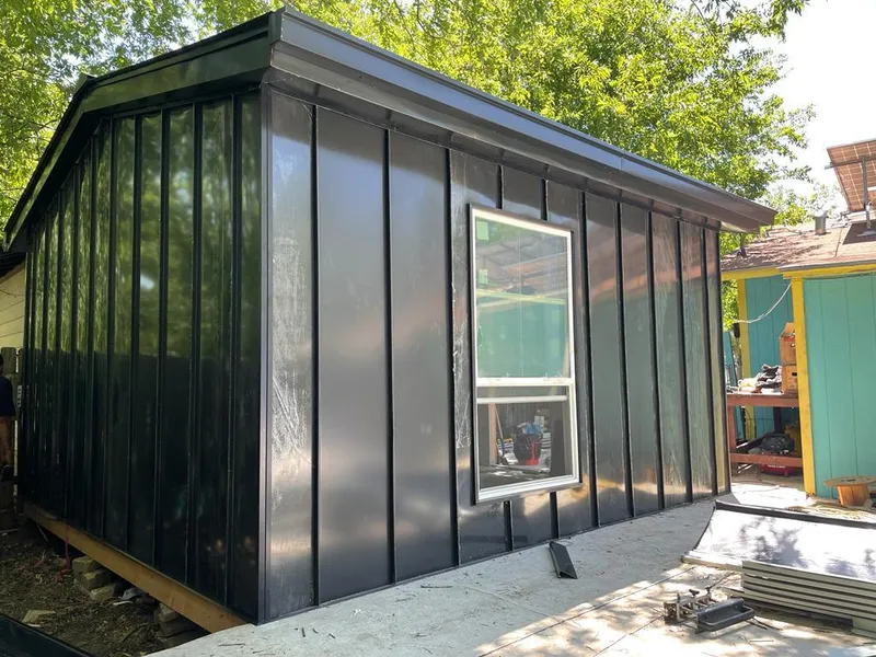 Black standing seam metal wall panels for Metal Roof Installation in Manhattan